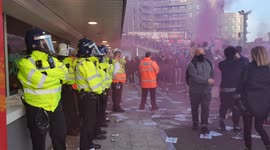 Police get into riot helmets at bottles continue to be thrown at Kroneke Out protest