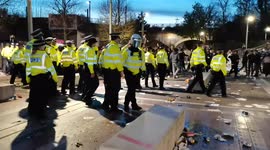 Police swarm in as object missiles are hurled at violent anti-Kroenke Arsenal protest