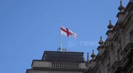 Flag of England flying over the UK's government offices on Whitehall - London