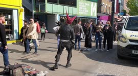 Rocker Performs The Electric Guitar and Welcome The Crowd To Camden Town