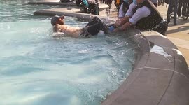 Dramatic moment police swoop on man in Trafalgar Square fountain after 'two-hour standoff'