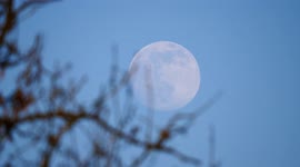 Pink full super moon rises over Wirksworth, Derbyshire Dales