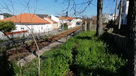 A train near Nazaré pass but dont stop, small village called Fanhais.