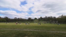 People Enjoying The Sunshine In Greenwich Park