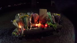 Sarah Everard Vigil - aftermath, flowers and letters placed on benches in memorial - clip 1