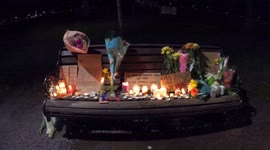 Sarah Everard Vigil - aftermath, flowers and letters placed on benches in memorial - clip 2