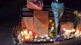 Sarah Everard Vigil - aftermath, flowers and letters placed on benches in memorial - clip 3