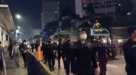 Indonesian police disperse thousands of football fans celebrating in city streets
