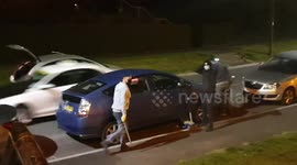 Husband watches helplessly as alleged thieves make off with catalytic converter from wife's parked car