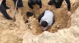 Chinese villagers race to rescue children buried by mud