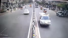 Two wheeler rams into pedestrian amid street in southern India
