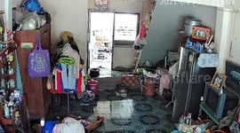 Chilling moment deadly cobra slithers into home as man sleeps on floor