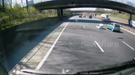 Have a seat: Sofa dropped on Manchester motorway leaves UK drivers baffled