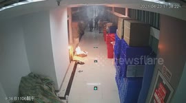 Girl triggers sprinkler system after igniting cardboard boxes in Chinese mall