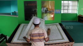 Seeing a 21-year-old giant hand written Koran at the Jakarta Islamic Center
