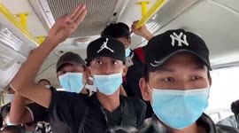 Protesters in Yangon take part in flash mob protest ON A BUS