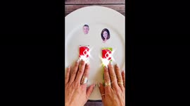 Artist recreates news anchors Larry Potash and Robin Baumgarten using just food
