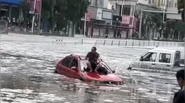 Streets submerged by icy water after hailstorm hits Chinese city