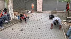 Thai police force locals caught without face masks to do push-ups