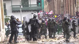 Riots between police and protesters in Bogota