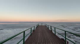 A smooth panorama of the northern shore of Lake Baikal in the middle of spring. Location: Bolshiye Koty village.