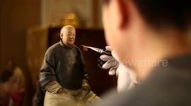 Zhang Yu, the Sixth-Generation Inheritor of Clay Figure Zhang, in the Workshop Full of Works Passed Down Through Generations