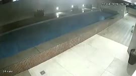 Swimming pool crashes through apartment block roof in Brazil