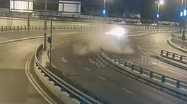Sparks fly out of car after it smashes into guardrails in southern China