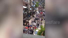 Defiant Myanmar protesters march in streets despite months of bloodshed