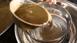 Zhang Yu Makes the Material for Clay Figure through Melting, Filtering, Waiting and Bailing out the Water