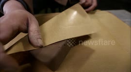 Zhang Yu's clay is ready only after wrapped up with tarpaulin and stored in basement at certain temperature and humidity for 3 years