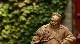 Zhang Yu Dries Puts Clay Figures in the Shade to Let them Dry