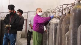 Facility in Kashmir refills 1,200 oxygen cylinders each day due to COVID-19 crisis