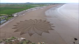 UK sand artist unveils one of his biggest designs yet on Somerset beach