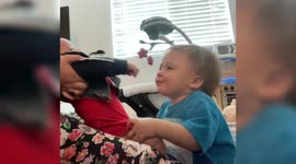 Brothers forever! Watch this adorable toddler refuse to let go of his baby sibling
