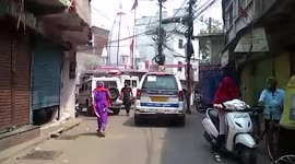 Woman runs after police vehicle to stop her husband's arrest in central India
