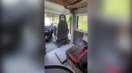Couple build world's first camper van which has its own LIFT!