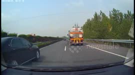 Car rolls after tanker crash in China