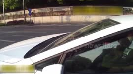 Woman stopped driving with cosmetic face mask - looped version