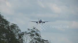 Monarch Airbus battles strong winds at Leeds
