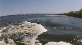 Drone captures surfer riding perpetual wave in Montreal