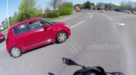 Biker in near-miss on UK road