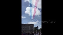 Red Arrow fly-past over Buckingham Palace in London
