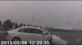 Rear-ended car spins out of control on China highway