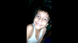 Little alien laughing boy