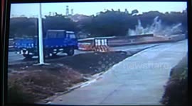 Driver crashes off unfinished road into river