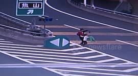 Grandma and granddaughter left on side of China highway