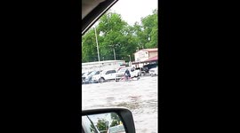 Man jetskis through Oklahoma floods