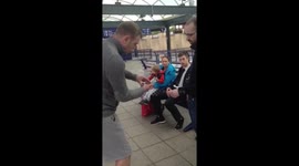 Signed playing card appears in train window