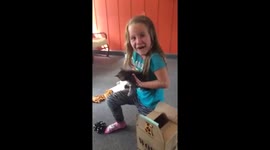 Girl's adorable kitten surprise